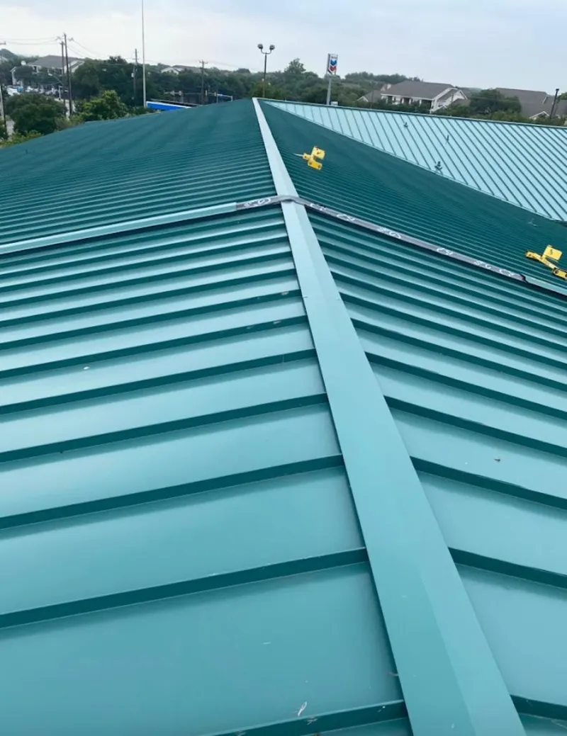 Green commercial metal roof ridge and valley for Metal Roof Repair in Baraboo