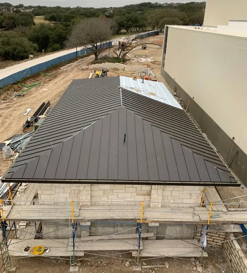 Metal roof new construction with scaffolding in Baraboo