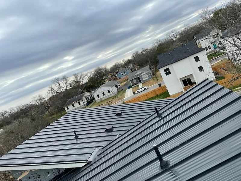 Standing seam metal roof panels with vents for Skylight Repair in Baraboo